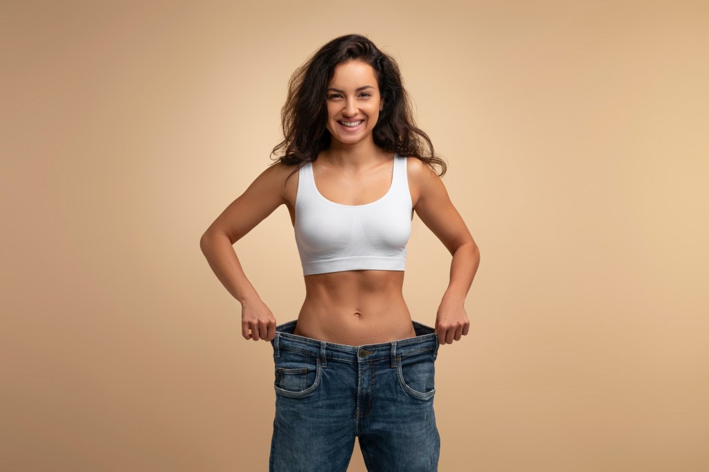 Women wearing oversized jeans