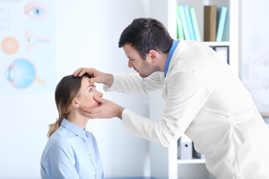 Doctor examining a patient