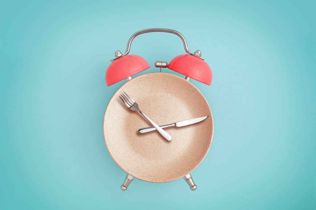 Alarm clock on plate