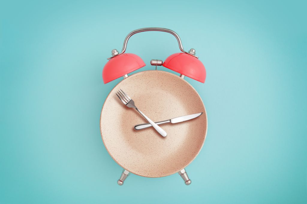 Alarm clock on plate