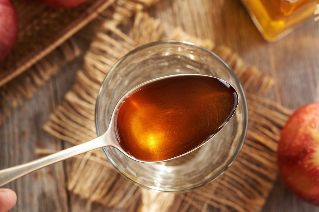 Tablespoon of ACV over water