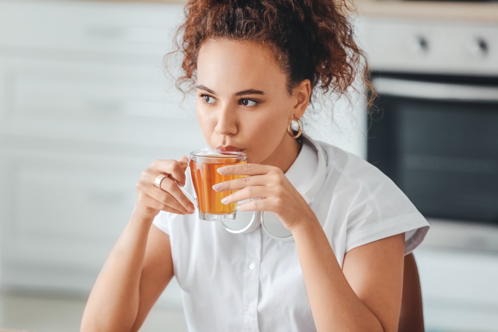 Woman drinking herbal tea 