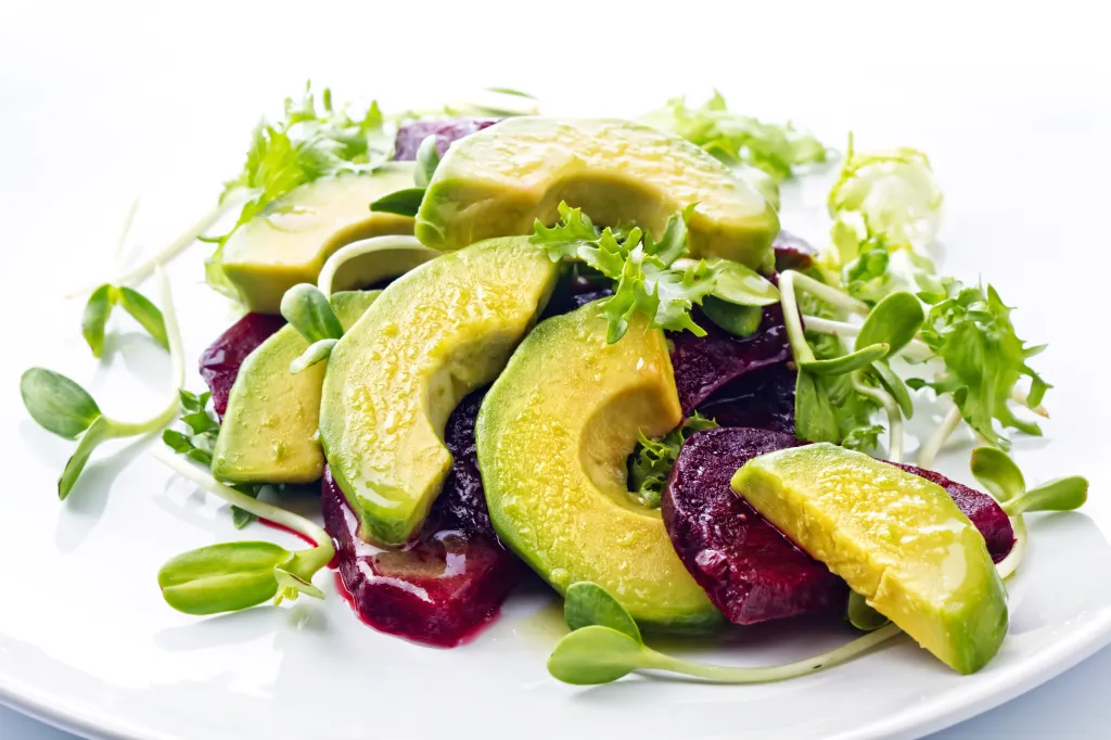 Plate of avocado and beets salad