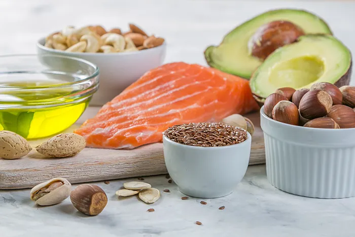 a picture of healthy keto foods such as salmon and olive oil