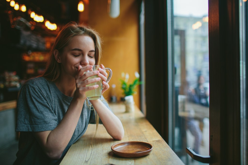 Woman drinking hot tea