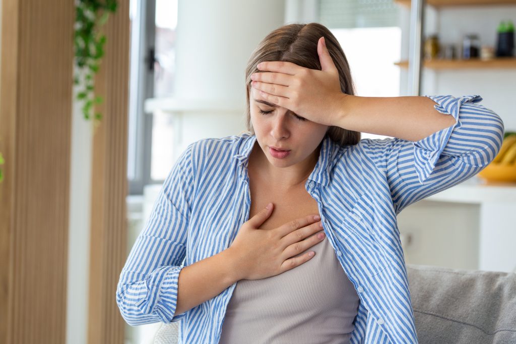 Woman feeling faint or lightheaded