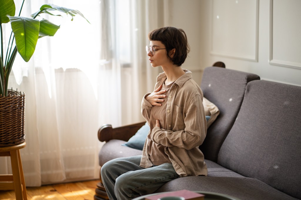 Woman practicing slow diaphragmatic breathing