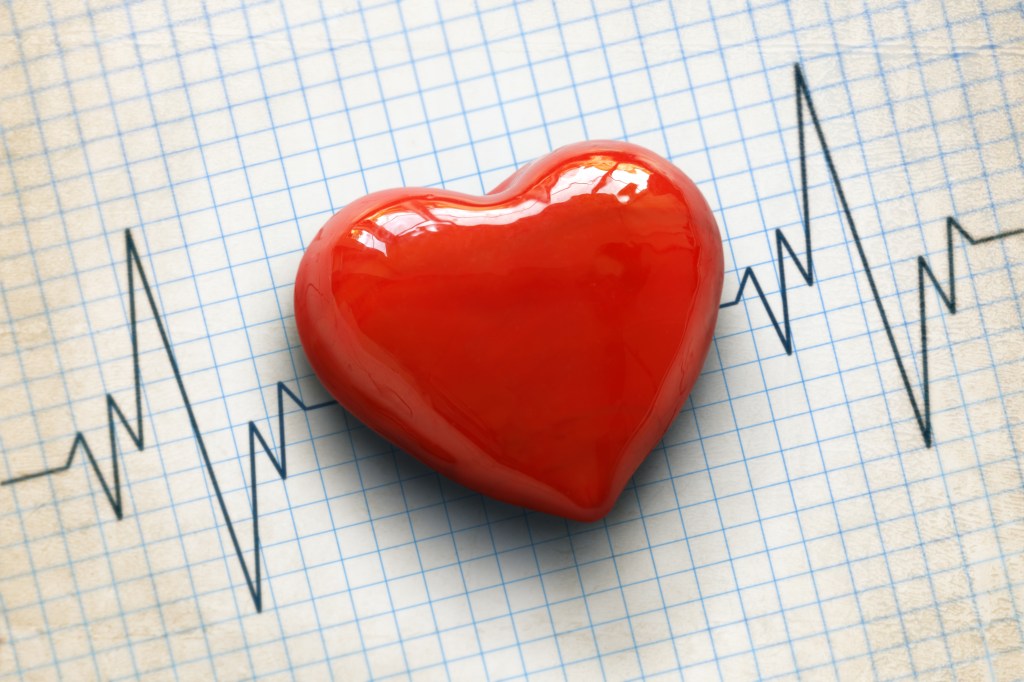 Red heart on graph paper