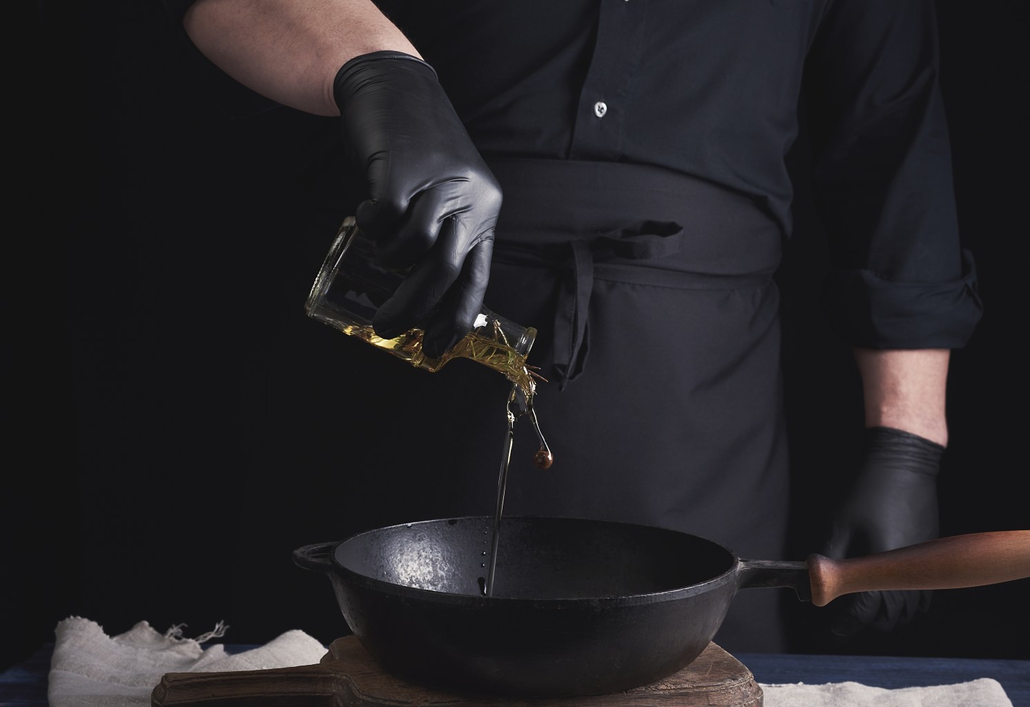 Pouring extra-virgin olive oil