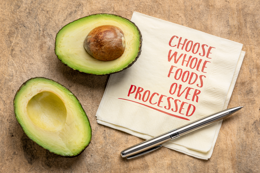 Sign stating choose whole foods over processed