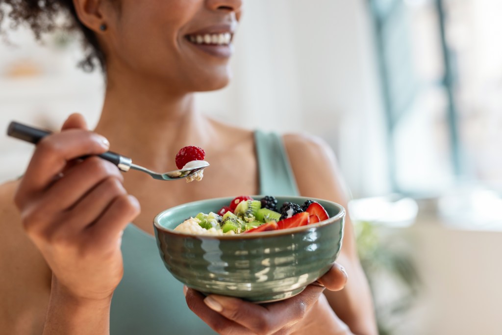 Woman eating breakfast 