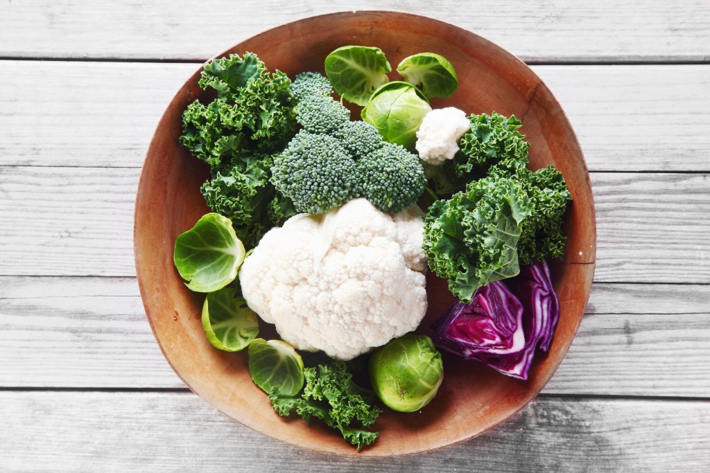 Cruciferous vegetables in a wooden bowl 