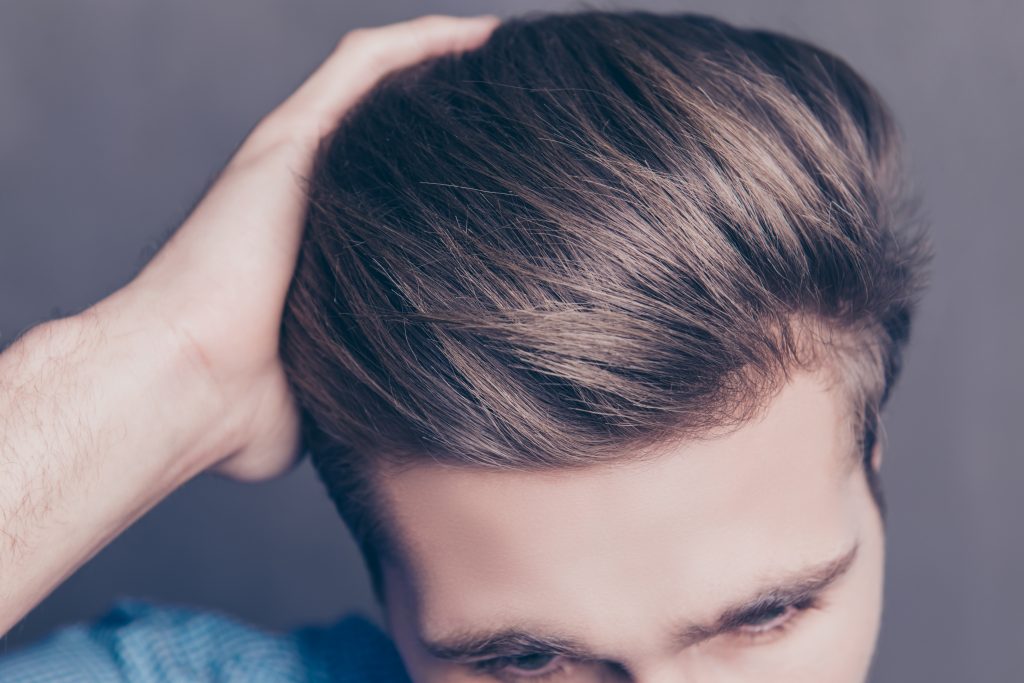 Young man with healthy hair