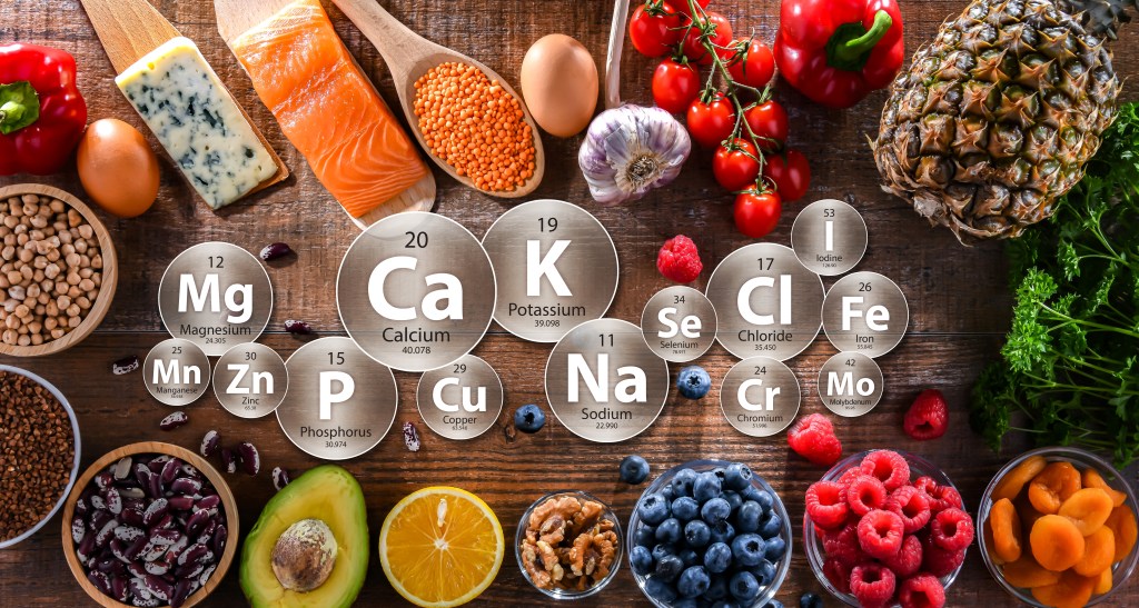 fit woman holding keto avocado