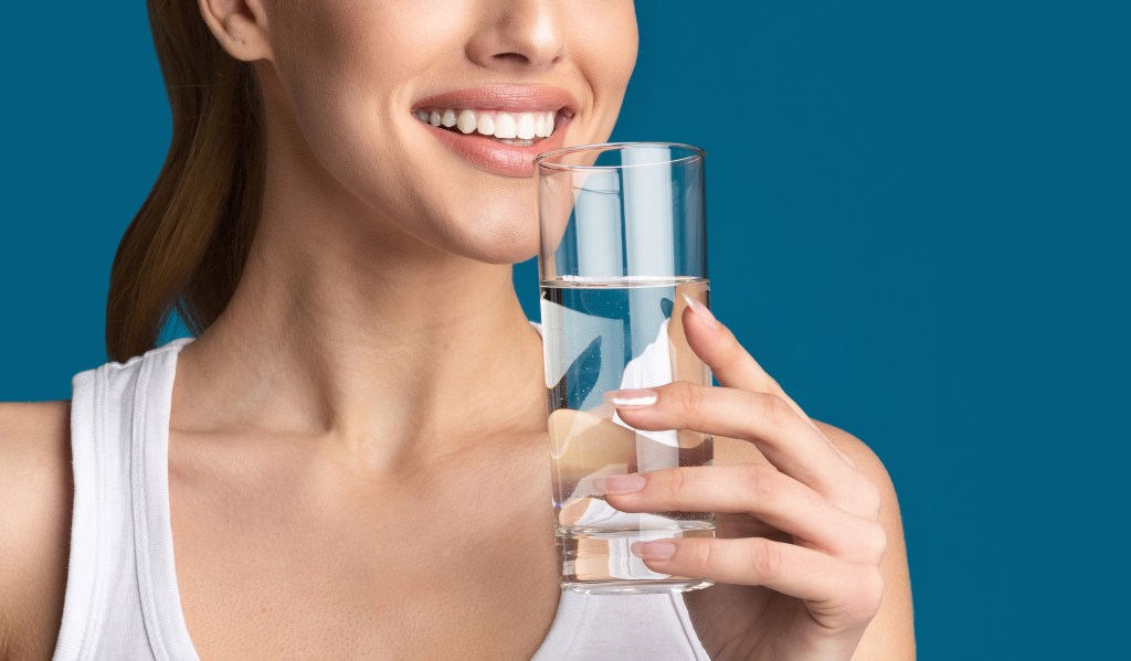 Woman drinking glass of water