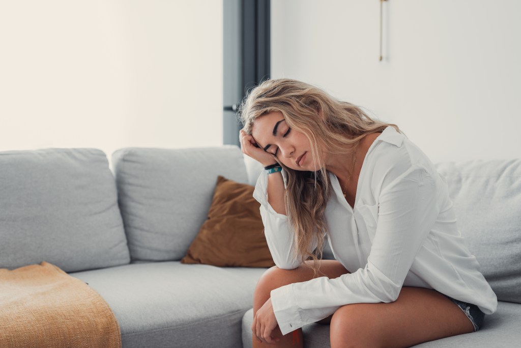 Young woman experiencing fatigue 