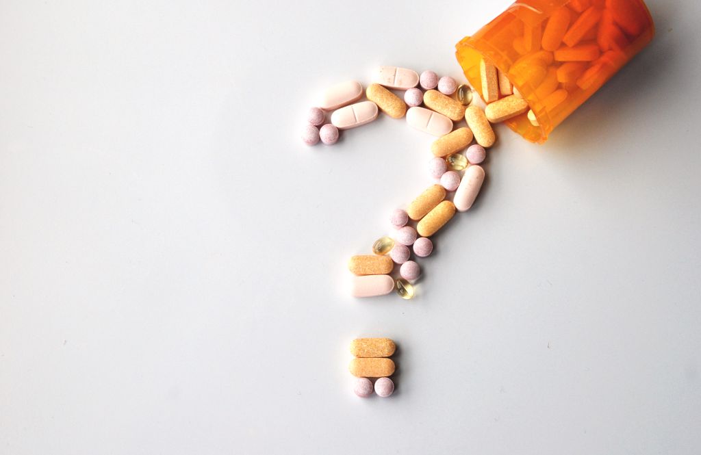 Supplements in question mark shape