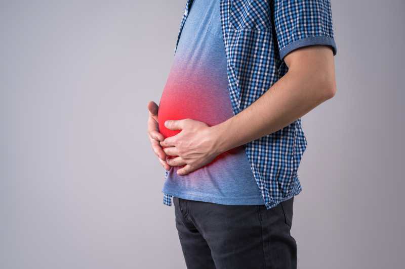 A man with a bloating stomach