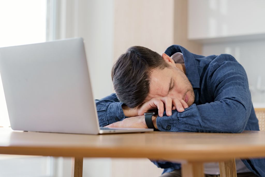 Man feeling exhausted 
