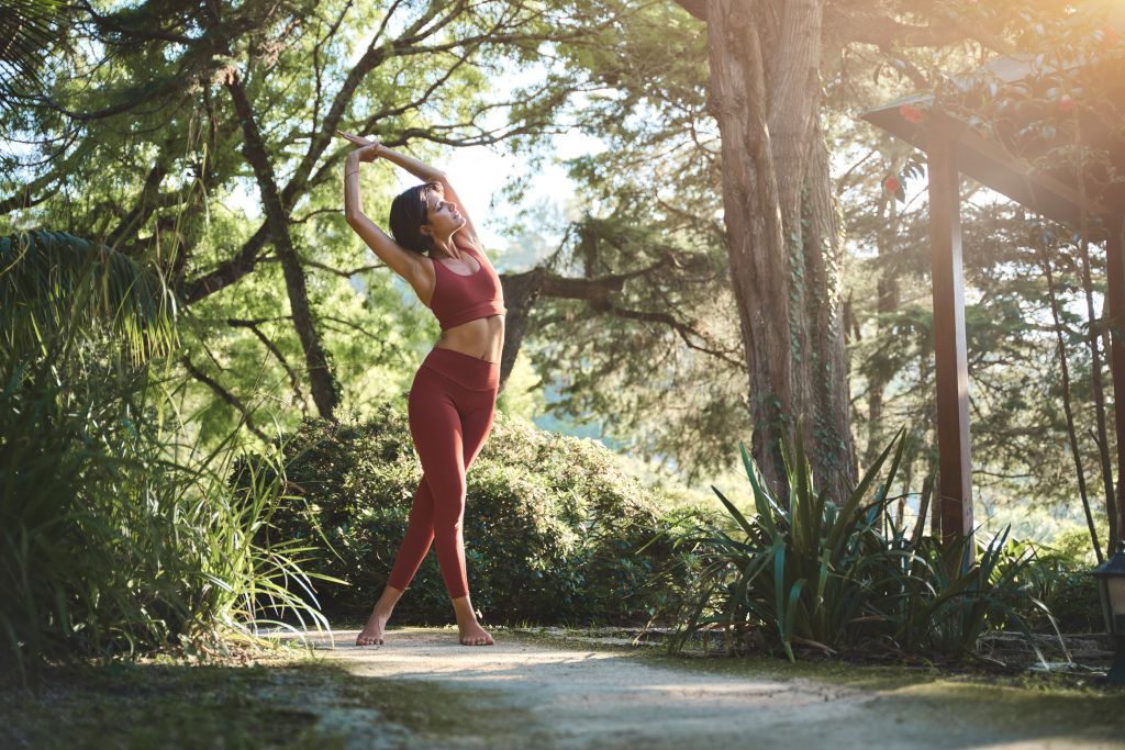 Woman standing in sunlight