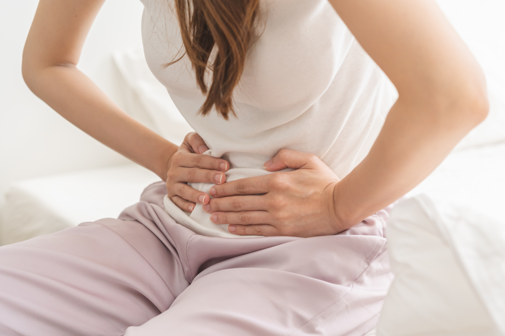 Woman with digestive discomfort
