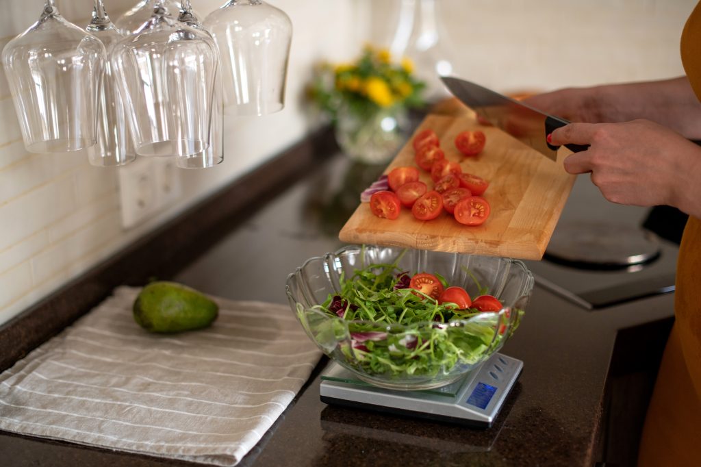 Weighing a bowl of salad