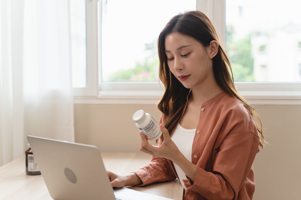 Woman reading supplement