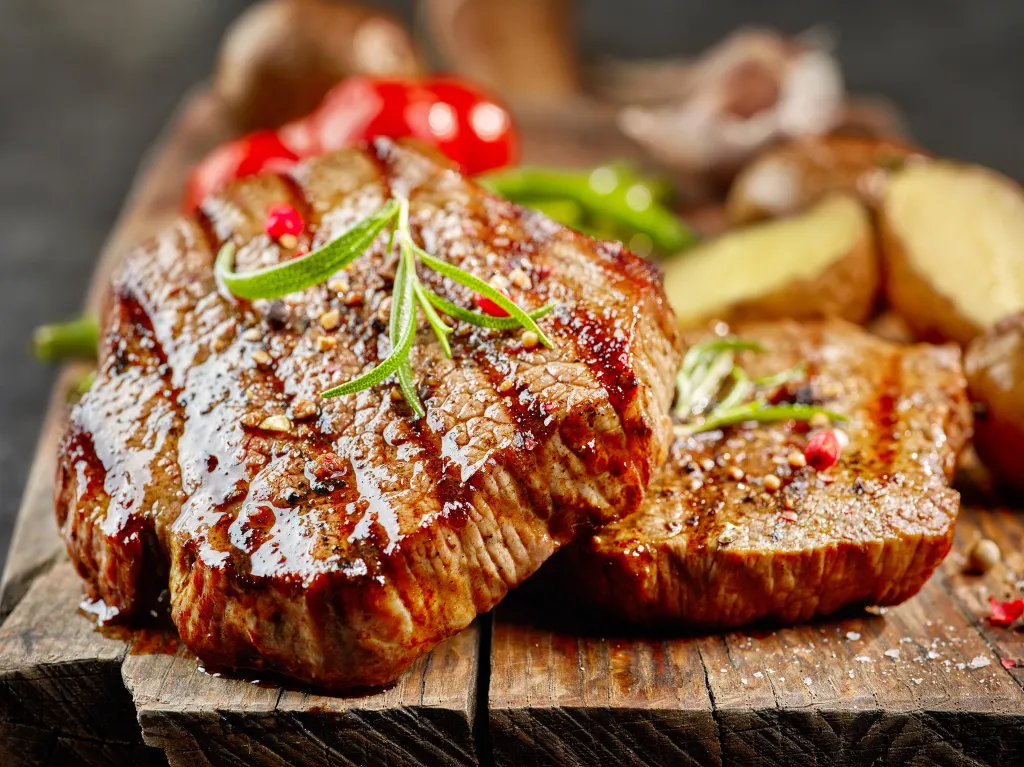 Grilled steak on a cutting board
