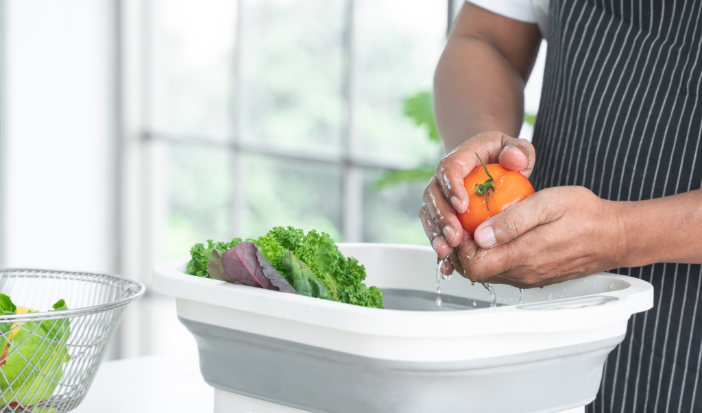 Man washing produce