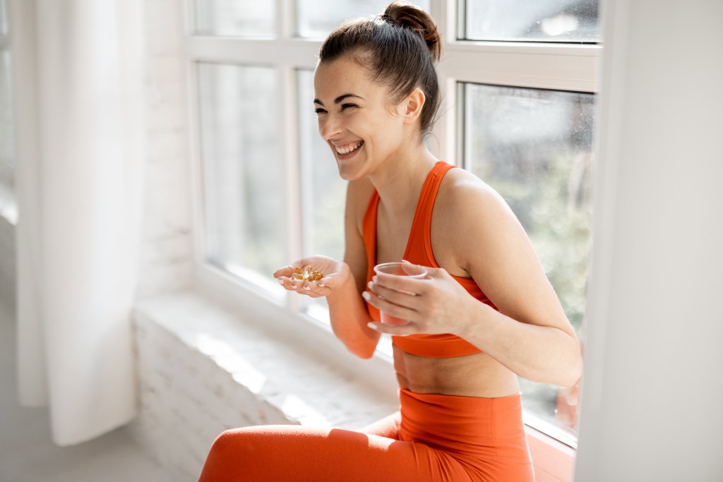 Woman taking supplements