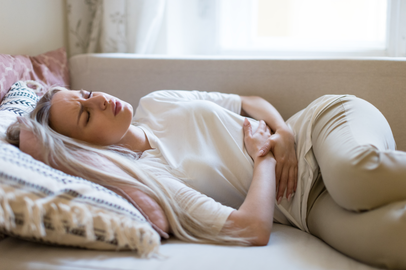 Young woman with digestive upset