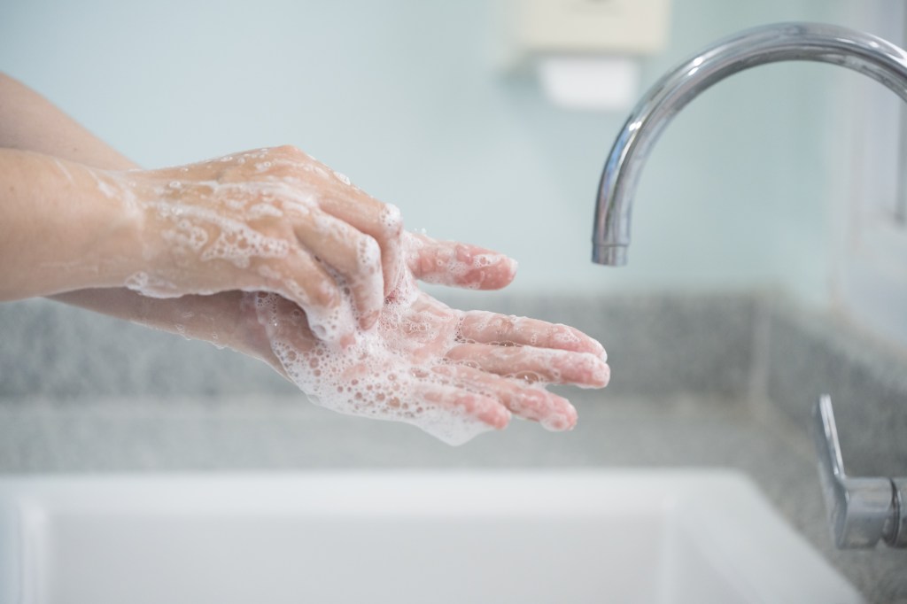 Person washing their hands