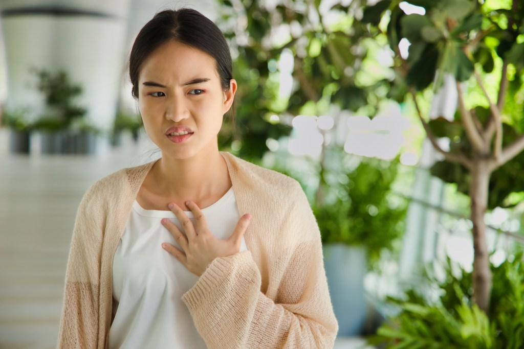 Woman with acid reflux