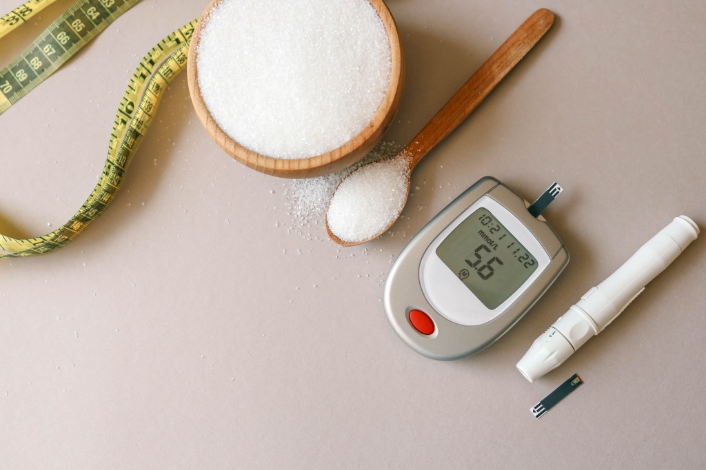 Blood glucose monitor and sugar