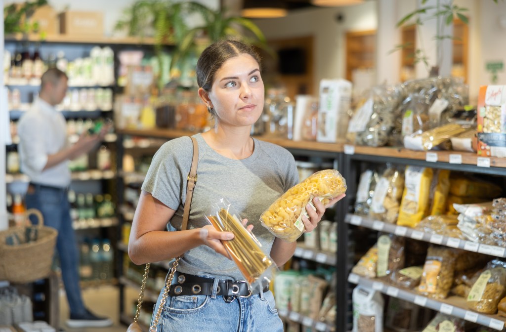Woman buying pasta