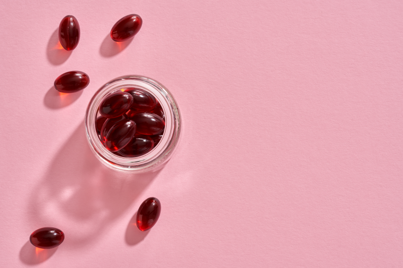 Krill oil capsules in a glass jar