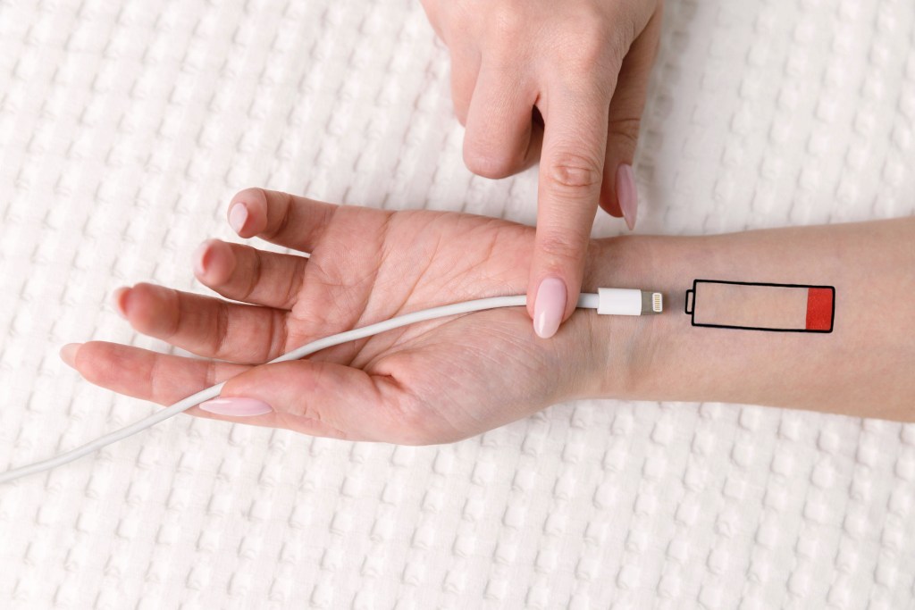 Person with fatigue trying to recharge