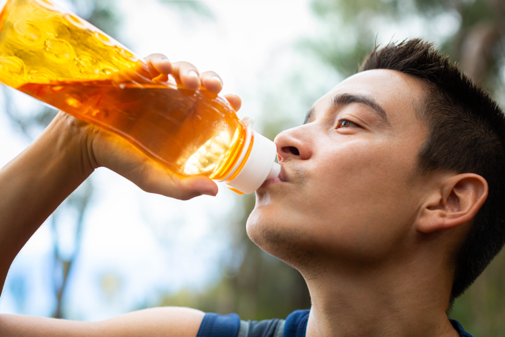 Man drinking electrolyte drink