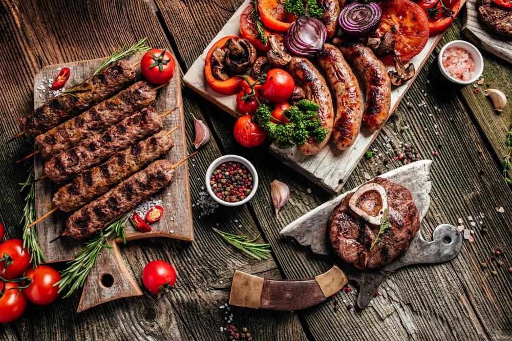 variety of cooked meat products