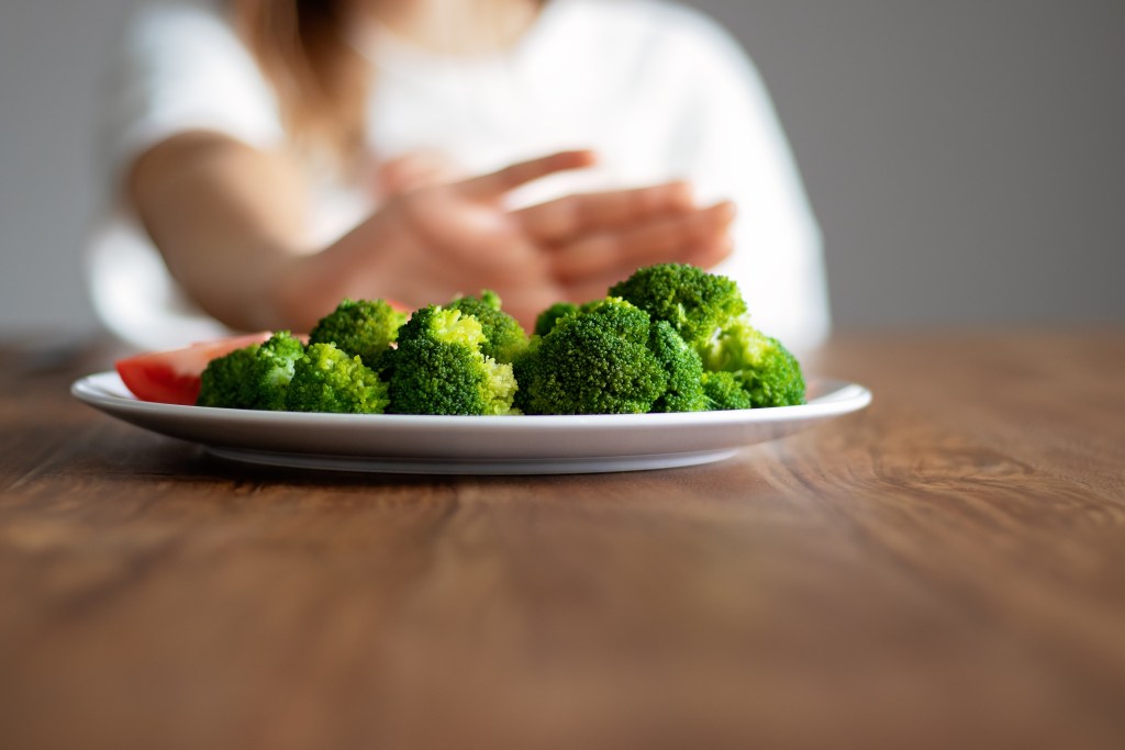 Person saying no to veggies 