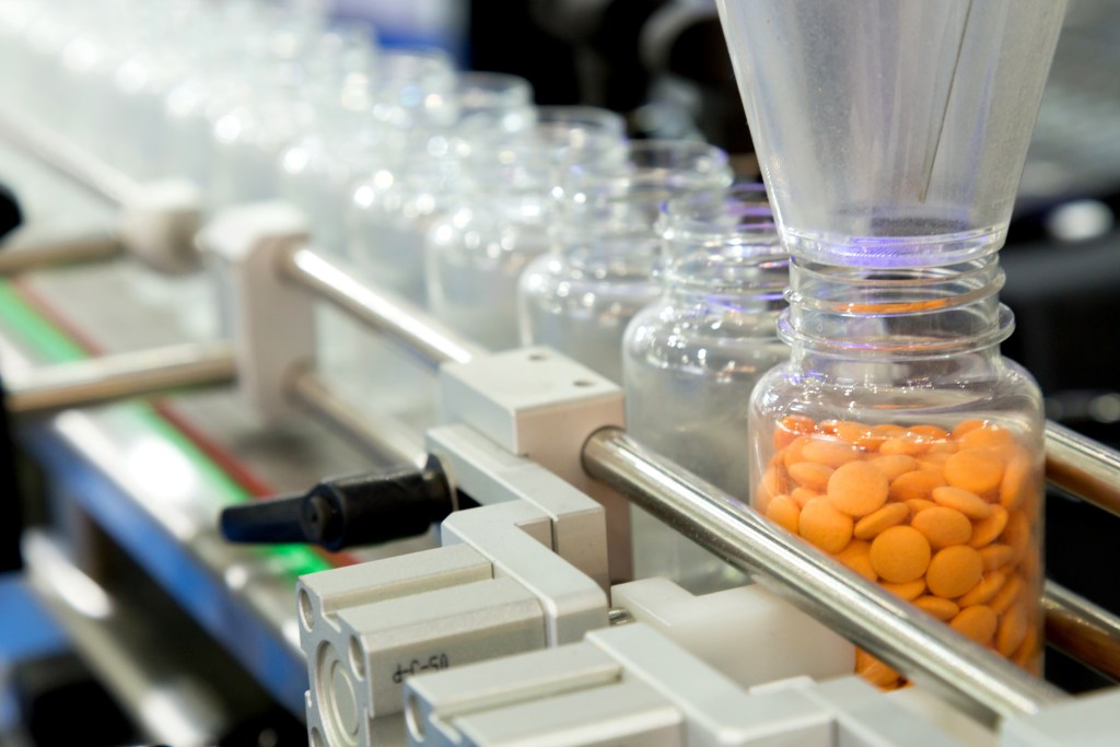 Pills filled into a container