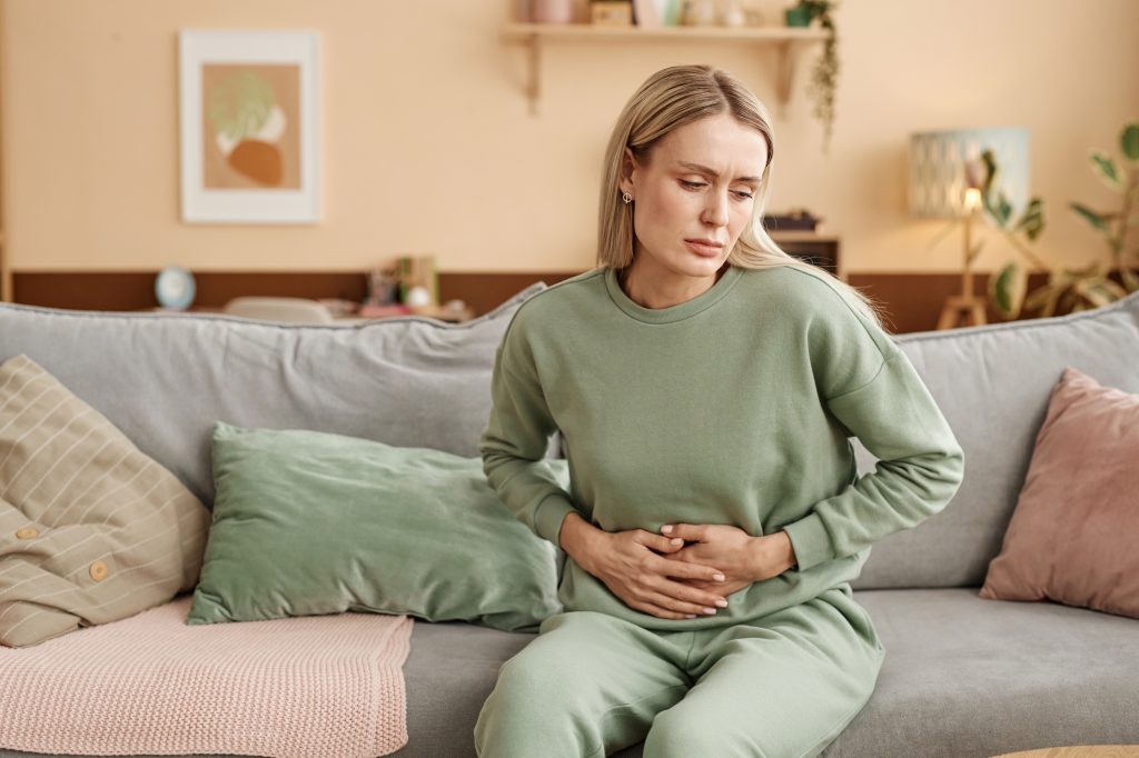 Woman with upset stomach