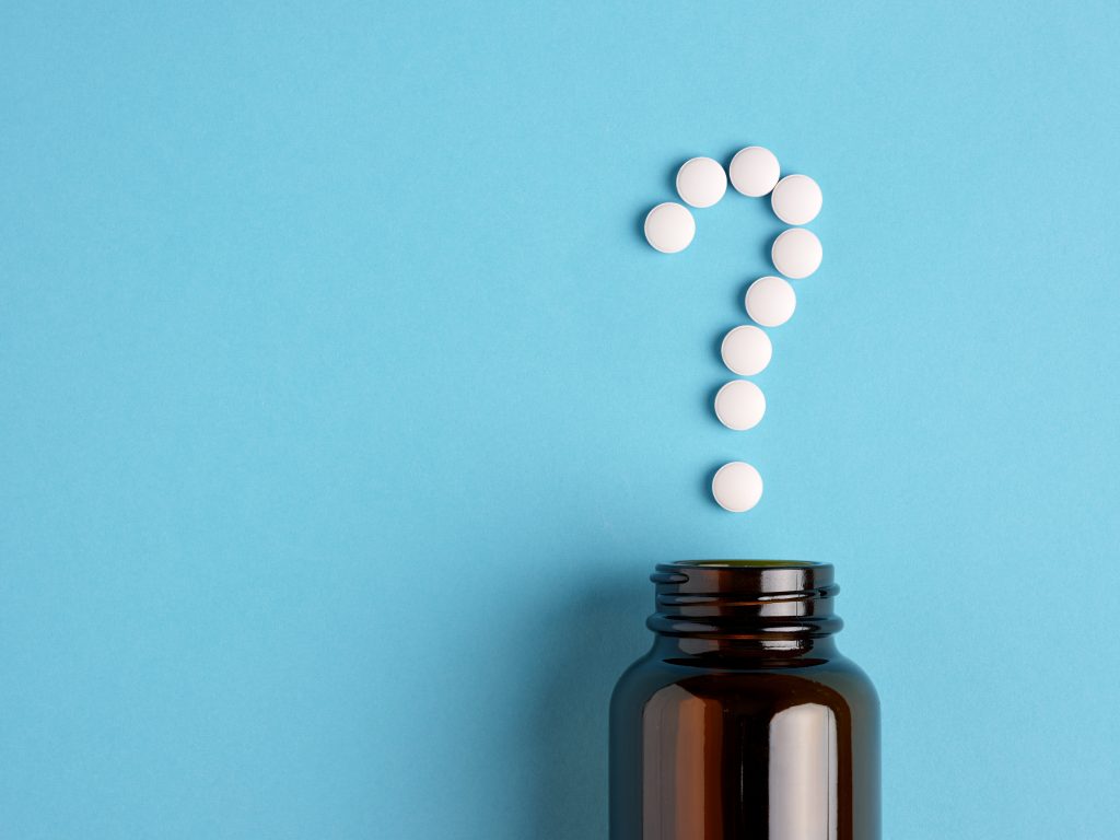 Pills forming a question mark