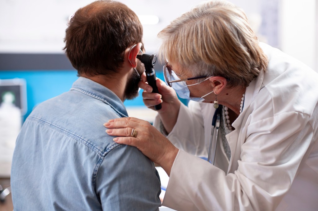 Doctor examining patient
