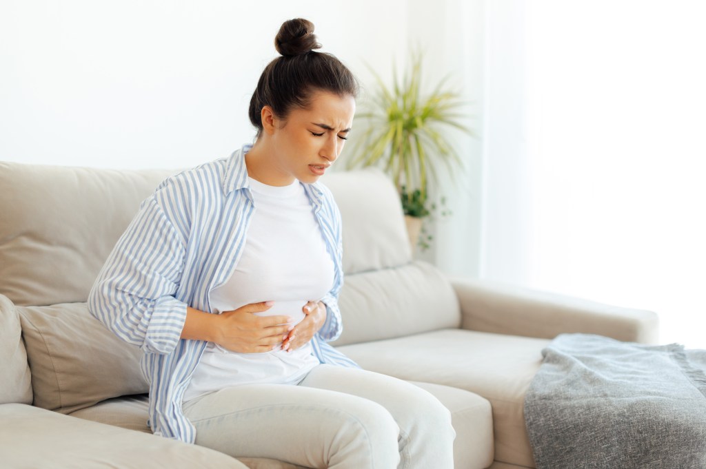Woman with stomach pain