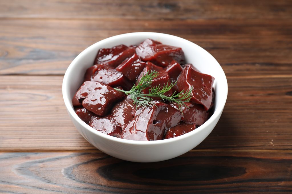 A bowl of raw beef liver