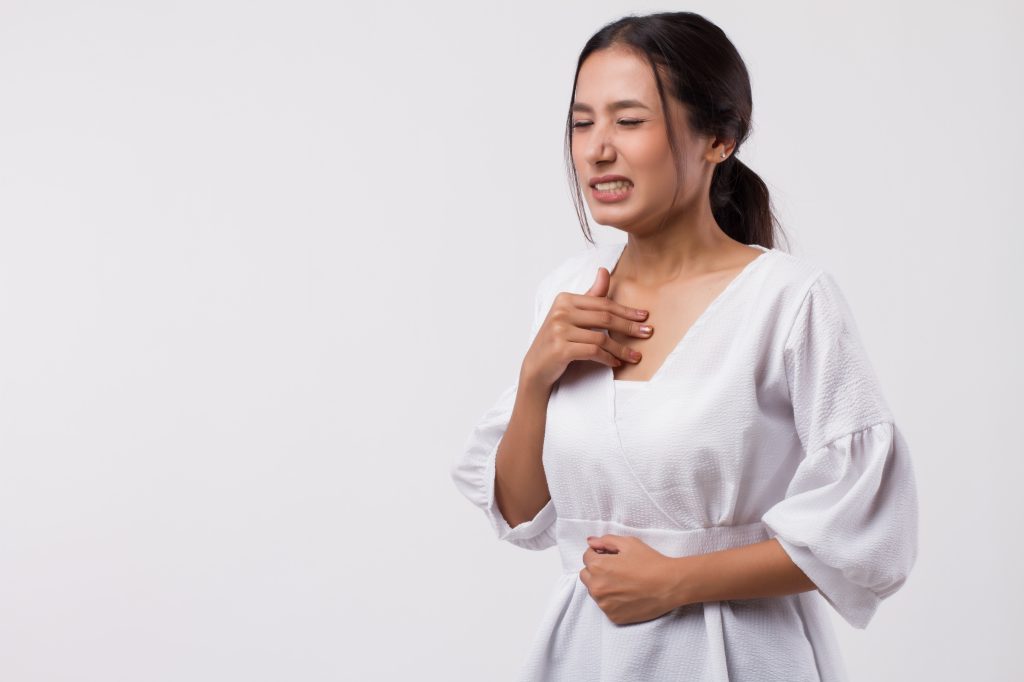 Woman with acid reflux