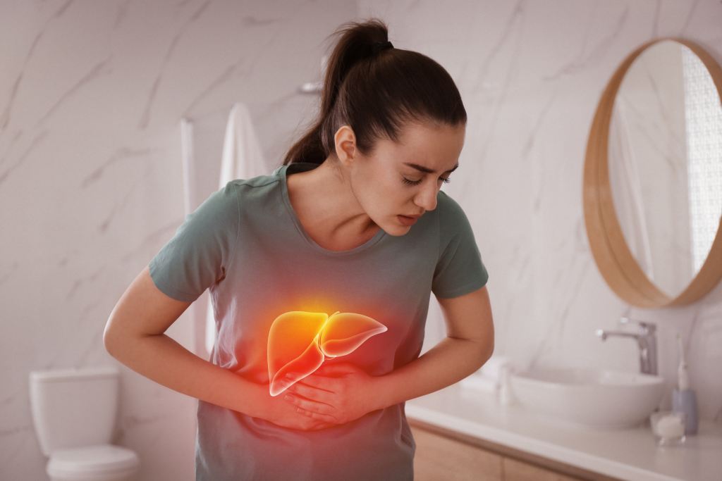 Woman suffering from liver pain