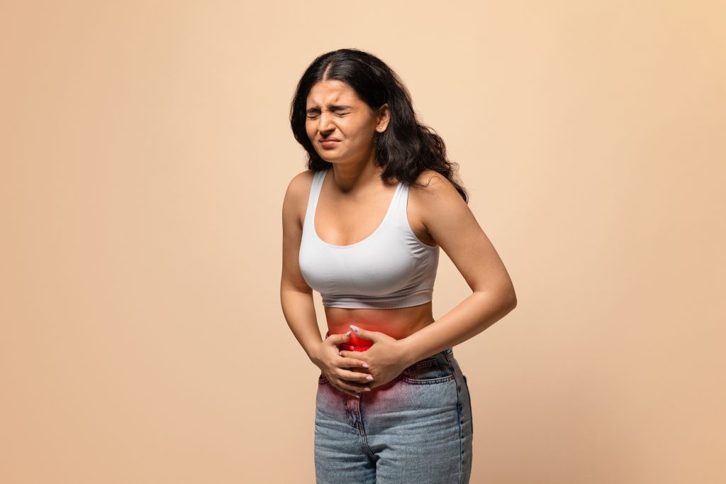 Sick Young Woman Having Stomach Ache