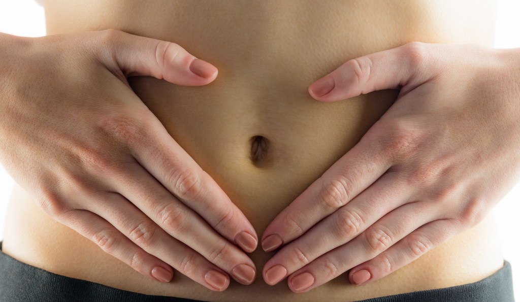 Woman with a healthy stomach